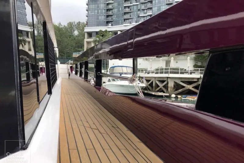 Slide: The Image of Luxurious 2011 Baia ONE HUNDRED yacht deck with sleek design and modern architecture. - 104