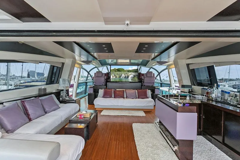 Slide: The Image of Luxurious interior of 2011 Baia xxx yacht with modern seating and panoramic windows. - 15