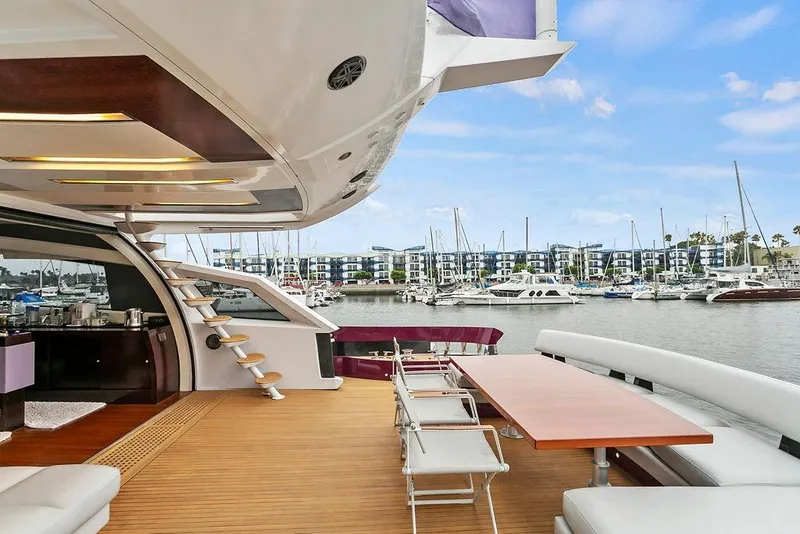 Slide: The Image of Luxurious 2011 Baia yacht with elegant deck, marina view, and modern amenities. - 18
