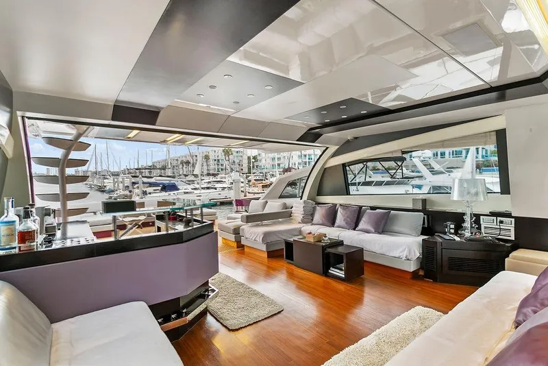 Slide: The Image of Luxurious 2011 Baia yacht interior with modern design, spacious seating, and marina view. - 21