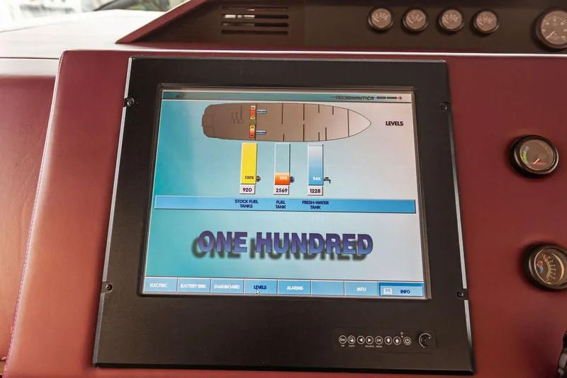 Slide: The Image of Touchscreen display on 2011 Baia yacht showing fuel and water tank levels. - 24