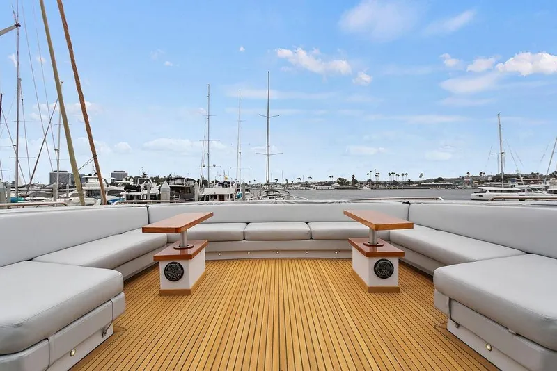 Slide: The Image of Spacious deck of 2011 Baia yacht with elegant seating and tables, overlooking marina. - 34