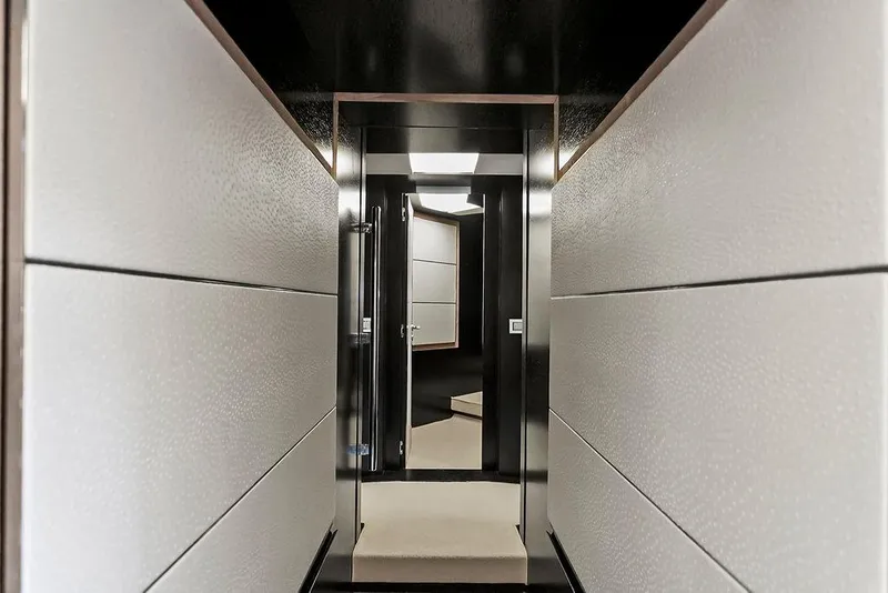 Slide: The Image of Sleek interior hallway of 2011 Baia xxx yacht, featuring modern design and elegant finishes. - 50