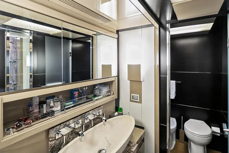 Slide: The Image of Luxurious yacht bathroom with modern fixtures, sleek design, and ample storage, Baia 2011 model. - 55