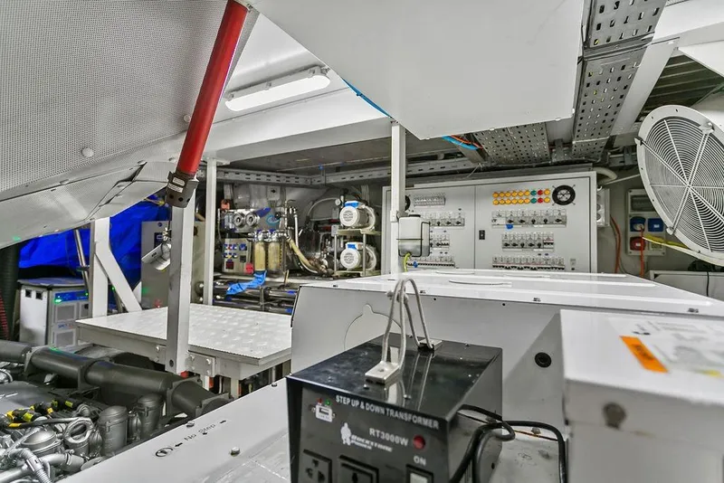 Slide: The Image of Engine room of 2011 Baia xxx yacht with control panels and machinery. - 59