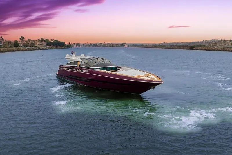 Slide: The Image of Luxurious 2011 Baia xxx yacht cruising at sunset on serene waters. - 6
