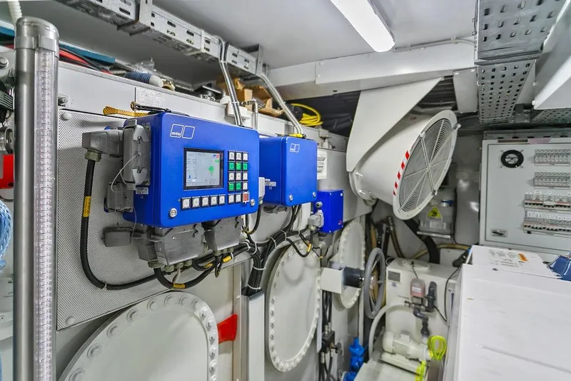 Slide: The Image of Engine room of 2011 Baia model xxx yacht with control panels and machinery. - 60