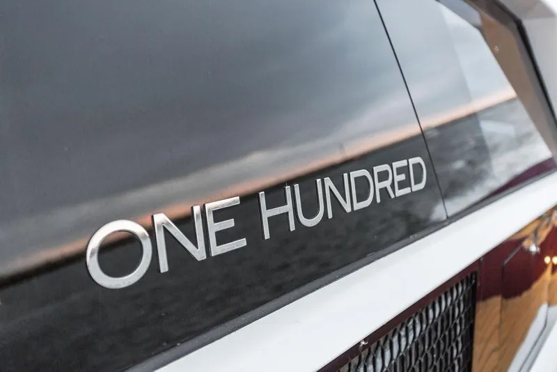 Slide: The Image of Close-up of "One Hundred" text on 2011 Baia yacht model xxx. - 62