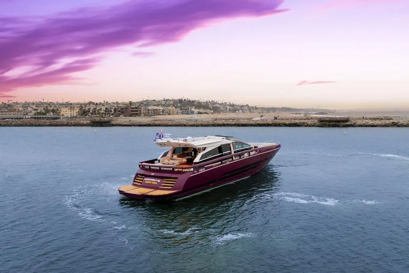 Slide: The Image of Luxurious 2011 Baia yacht cruising near scenic coastline at sunset. - 8