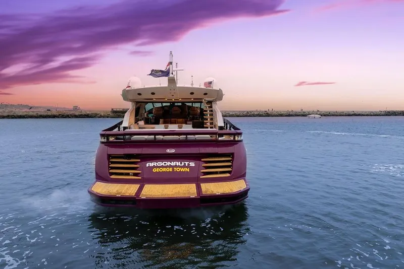 Slide: The Image of Luxury Baia yacht "Argonauts" on water at sunset, 2011 model. - 9