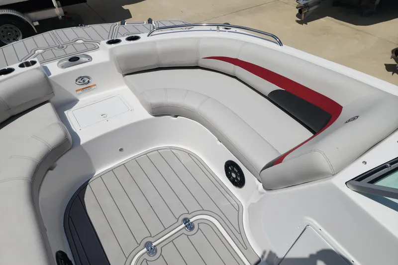 Slide: The Image of 2023 Hurricane SunDeck 187 OB boat interior with spacious seating and modern design. - 13