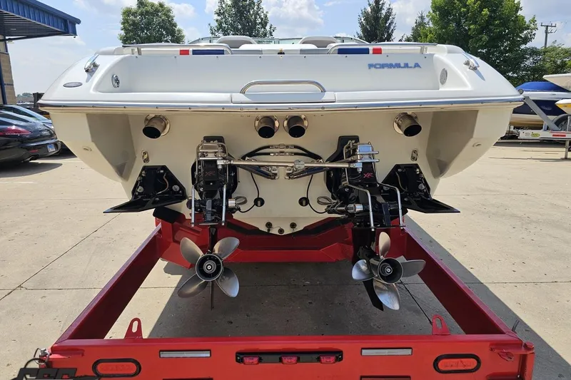 Slide: The Image of 2005 Formula 353 FASTech boat on trailer, rear view showing dual propellers. - 30
