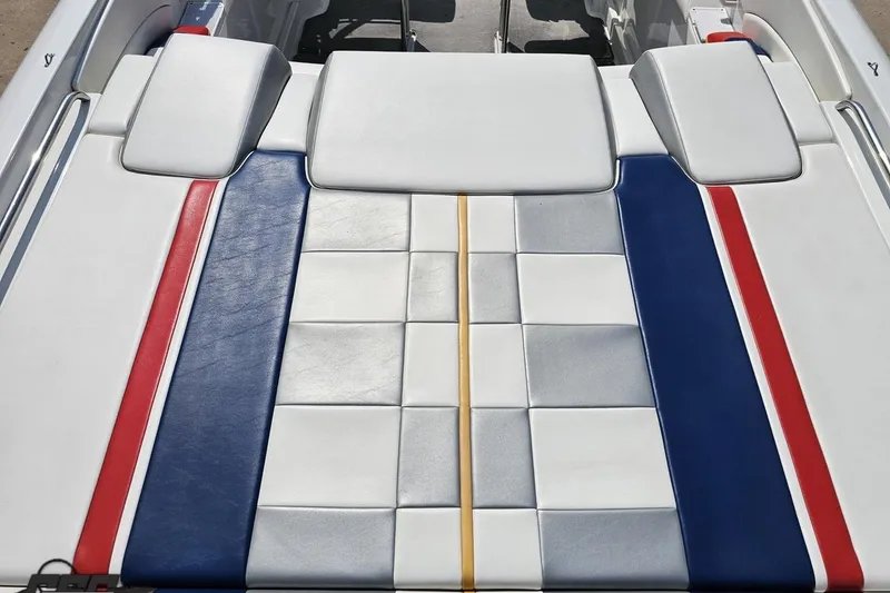Slide: The Image of 2005 Formula 353 FASTech boat interior with red, blue, and white upholstery design. - 40