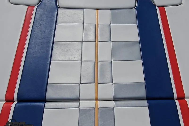 Slide: The Image of 2005 Formula 353 FASTech boat seat with red, blue, and white upholstery design. - 41