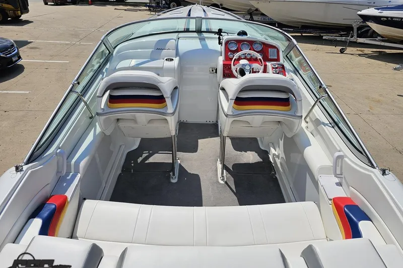 Slide: The Image of 2005 Formula 353 FASTech boat interior with colorful seats and sleek dashboard design. - 46