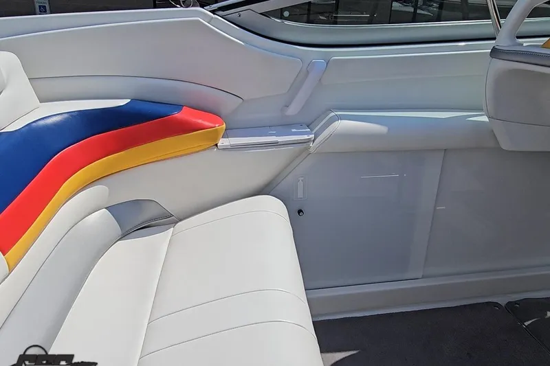 Slide: The Image of 2005 Formula 353 FASTech boat interior with colorful seating and sleek design. - 55