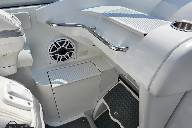 Slide: The Image of 2005 Formula 353 FASTech boat interior with speaker and stainless steel railing. - 58