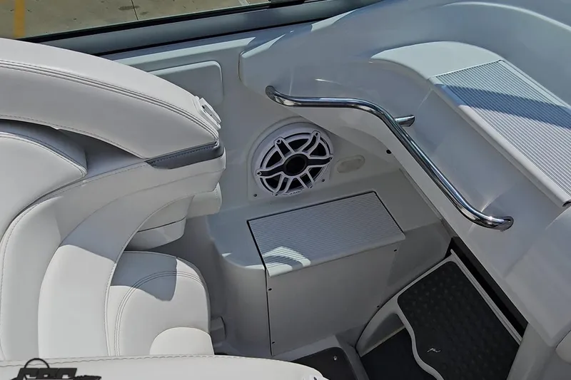 Slide: The Image of 2005 Formula 353 FASTech boat interior with white seating and speaker detail. - 59