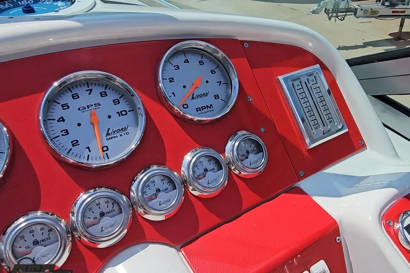 Slide: The Image of Dashboard of a 2005 Formula 353 FASTech boat with Livorsi gauges and controls. - 64