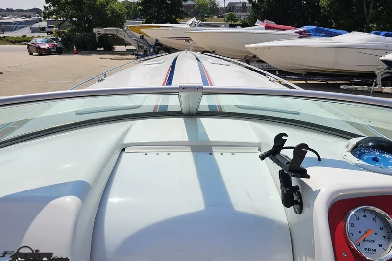 Slide: The Image of 2005 Formula 353 FASTech boat dashboard with gauge and windshield view. - 70