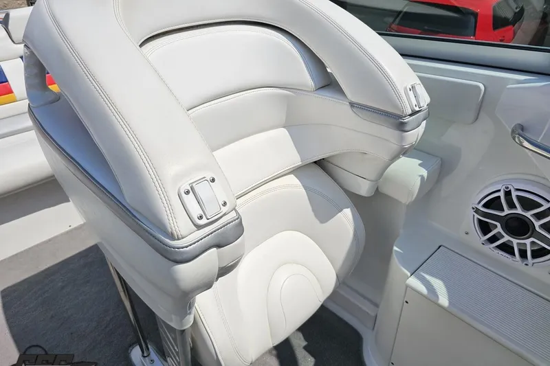 Slide: The Image of 2005 Formula 353 FASTech boat interior with white leather seating and speaker detail. - 88