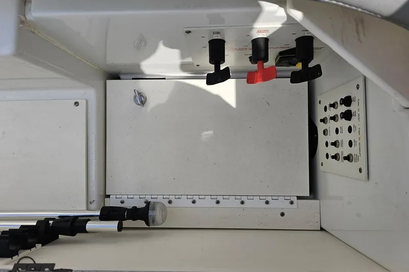 Slide: The Image of Control panel and switches inside a 2005 Formula 353 FASTech boat. - 91