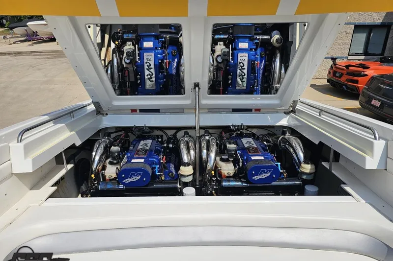 Slide: The Image of 2005 Formula 353 FASTech boat engine compartment with twin high-performance engines. - 94