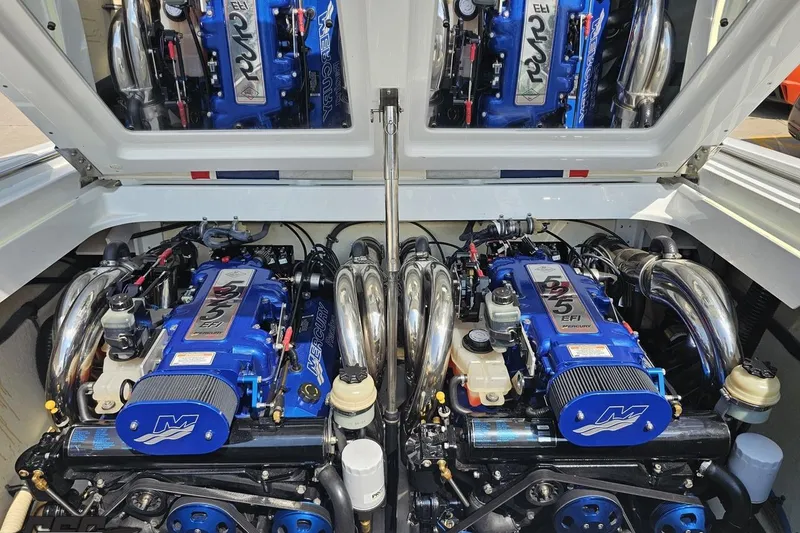 Slide: The Image of 2005 Formula 353 FASTech engine compartment with dual Mercury EFI engines. - 96