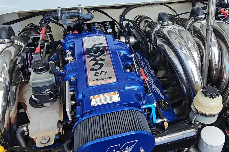 Slide: The Image of 2005 Formula 353 FASTech engine with Mercury Racing 525 EFI, showcasing performance components. - 99