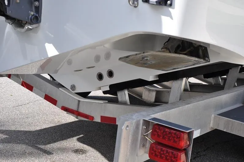 Slide: The Image of 2020 Yellowfin 32 Offshore boat on trailer, rear view showing hull and trailer details. - 10