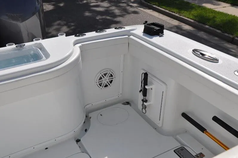 Slide: The Image of 2020 Yellowfin 32 Offshore boat interior with storage and speaker. - 16
