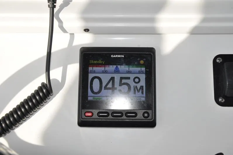 Slide: The Image of Garmin marine display on 2020 Yellowfin 32 Offshore boat dashboard. - 28