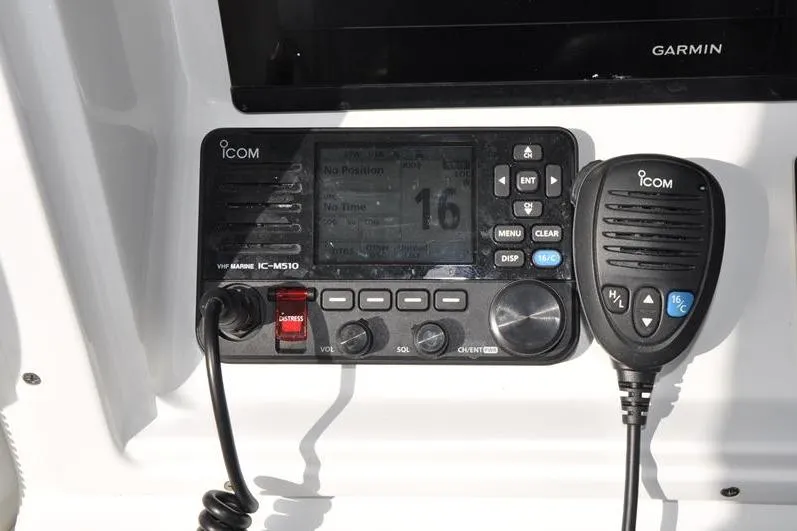 Slide: The Image of VHF marine radio on 2020 Yellowfin 32 Offshore boat dashboard. - 29