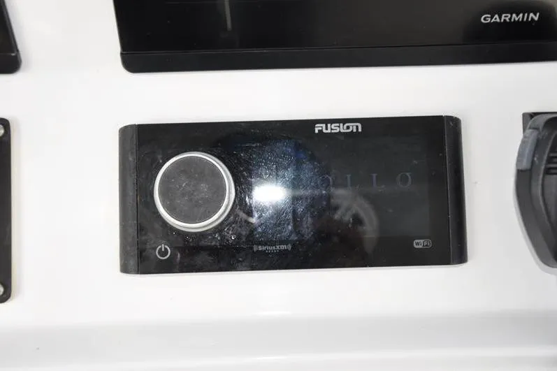 Slide: The Image of Fusion audio system on 2020 Yellowfin 32 Offshore boat dashboard. - 30