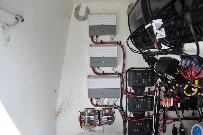 Slide: The Image of 2020 Yellowfin 32 Offshore boat electrical system with wiring and components. - 37