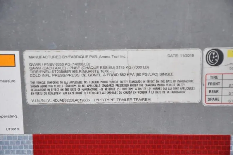 Slide: The Image of Label on a 2020 Yellowfin 32 Offshore trailer, detailing weight and tire specifications. - 55