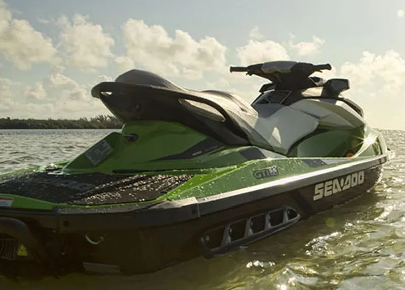 Slide: The Image of Manufacturer Provided Image: 2014 Sea-Doo GTI SE 130 jet ski on water, side view. - 4