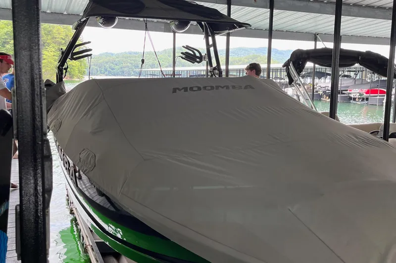 Slide: The Image of 2022 Moomba Mojo engine compartment with visible hoses and components. - 4