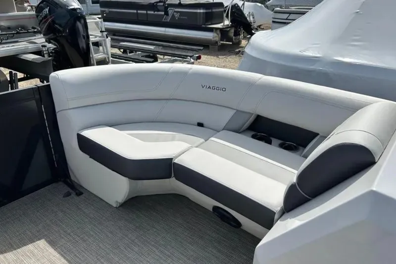 Slide: The Image of 2023 Viaggio D23U boat interior with plush seating and cup holders. - 10
