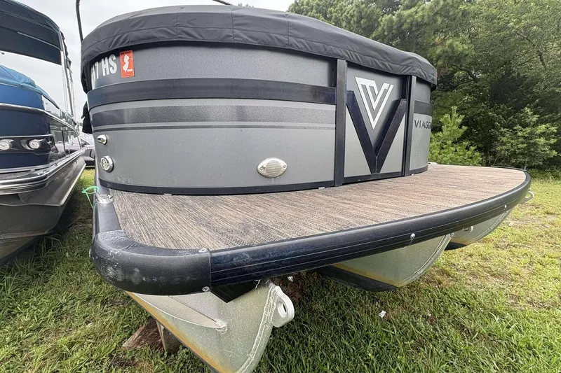 Slide: The Image of 2023 Viaggio D23U pontoon boat with sleek design on grassy area. - 3