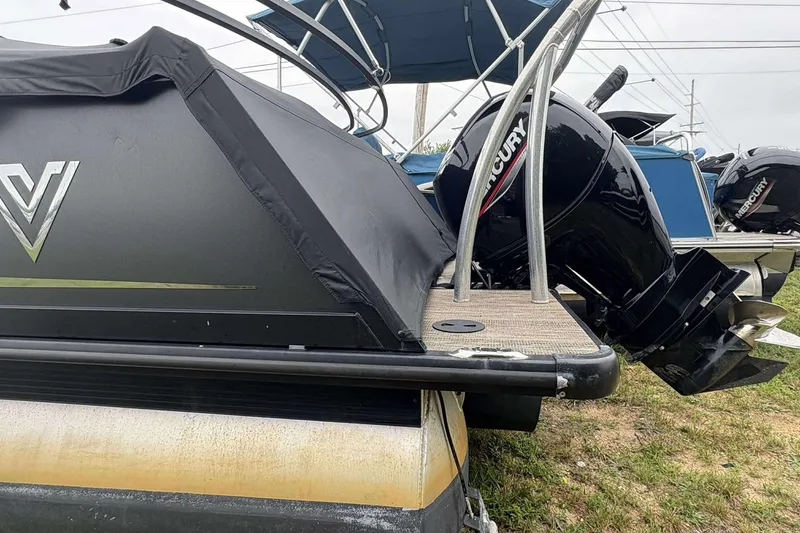 Slide: The Image of 2023 Viaggio D23U boat with Mercury outboard motor, covered and docked. - 6