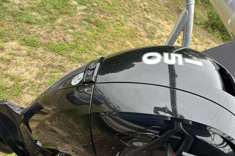 Slide: The Image of 2023 Viaggio D23U outboard motor, black finish, on grassy background. - 7