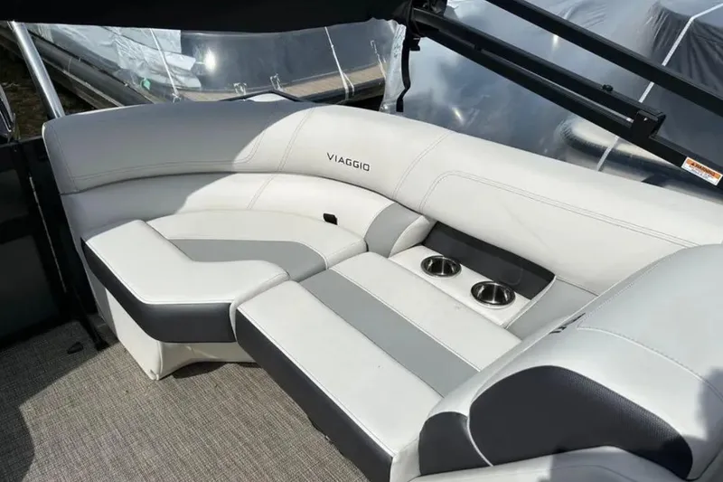 Slide: The Image of Luxurious seating on 2023 Viaggio D23U boat with cup holders and sleek design. - 9