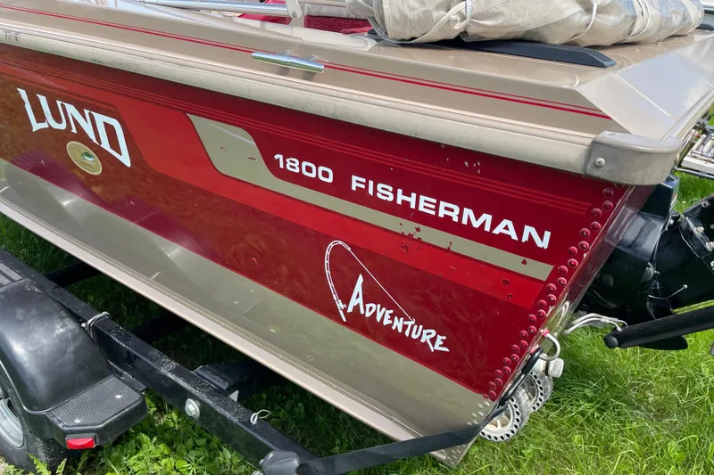 Slide: The Image of 1998 Lund 1800 Fisherman ITS boat with MerCruiser Alpha One outdrive and stainless steel propeller. - 6
