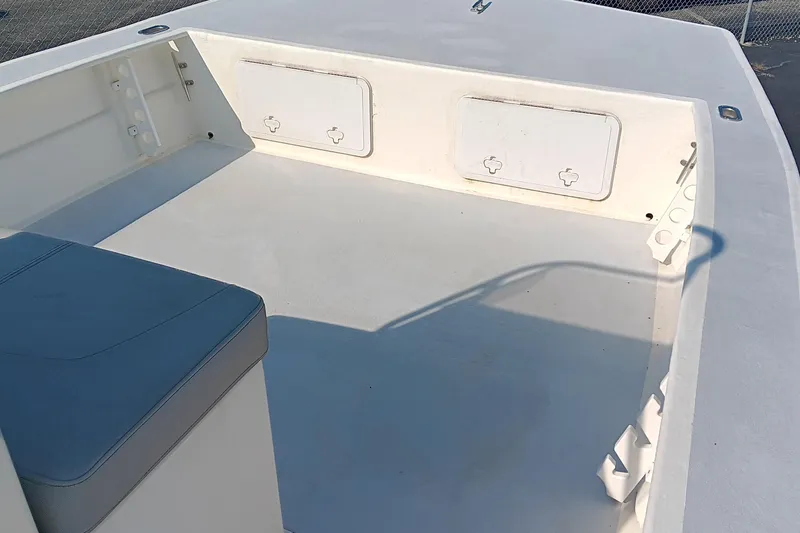 Slide: The Image of 2023 May-Craft 22 Hancock Skiff on trailer, light blue hull, parked outdoors. - 7