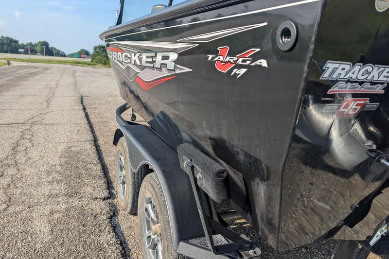 Slide: The Image of 2023 Tracker Targa V-19 Combo Tournament Edition boat on trailer, side view. - 4