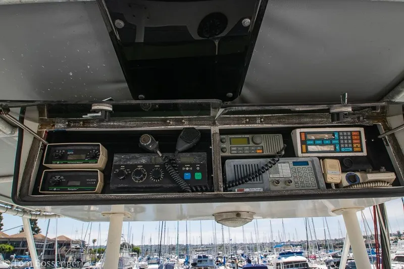 Slide: The Image of Control panel of a 1986 Bertram 42 Convertible boat with navigation and communication equipment. - 29