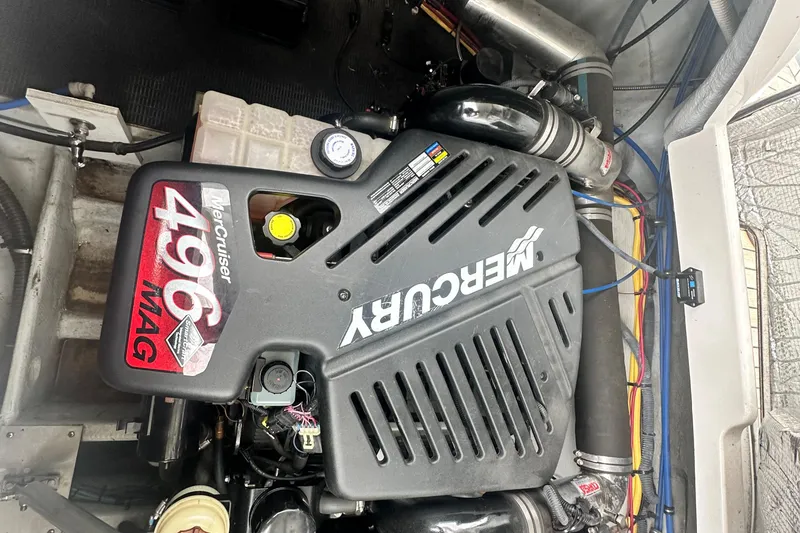 Slide: The Image of 2007 Chris-Craft Corsair 33 engine compartment featuring a MerCruiser 496 MAG engine. - 11