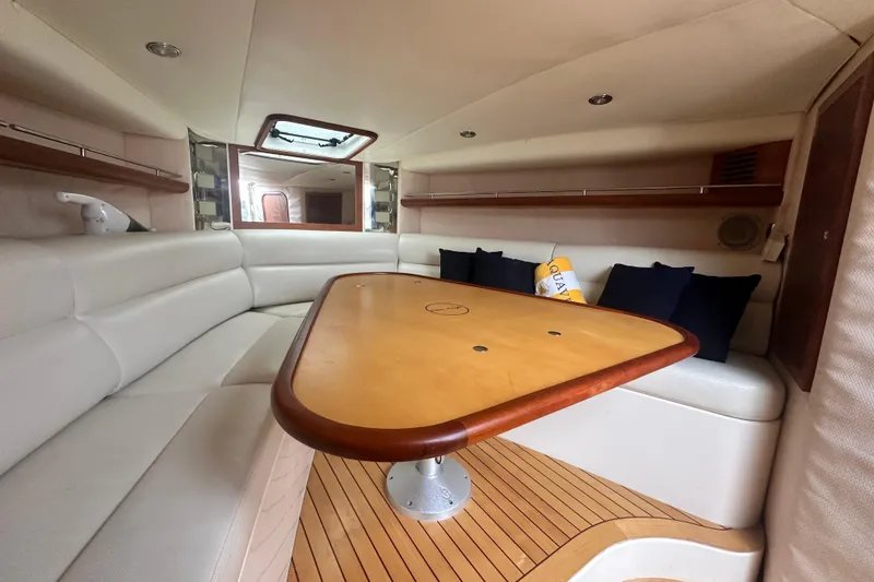 Slide: The Image of Luxurious interior of 2007 Chris-Craft Corsair 33 Heritage Edition with elegant seating and table. - 13