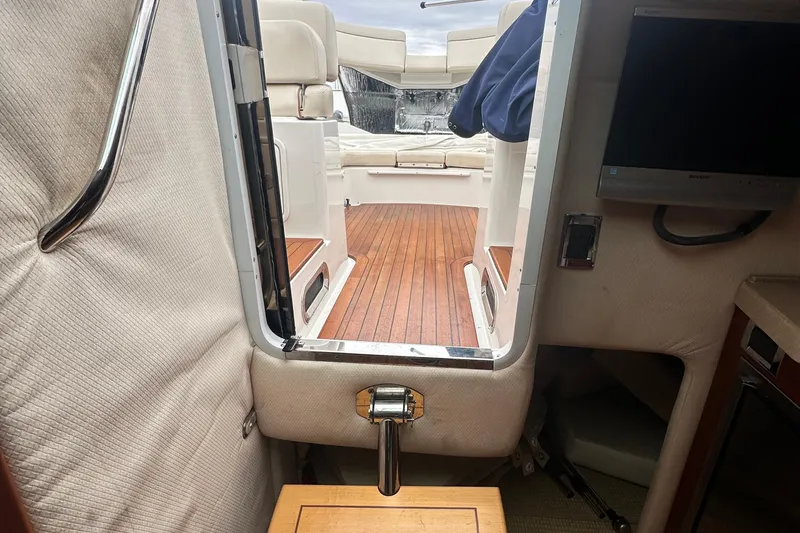 Slide: The Image of Interior view of 2007 Chris-Craft Corsair 33 Heritage Edition boat with wooden flooring. - 20